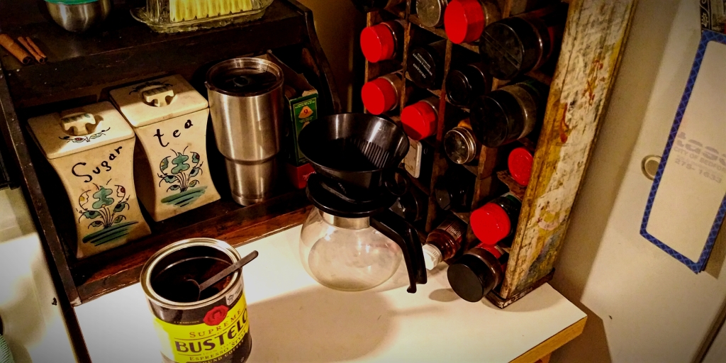 Photo of Coffee Nook: Everything in place. No thinking required before the caffeine hits... coffee, filter, scoop, pot, mug. Half in half within reach in fridge without moving.